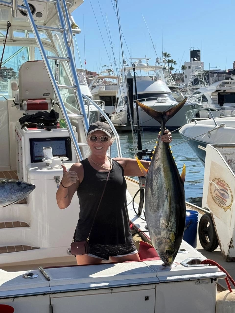 Angler with sailfish on deck