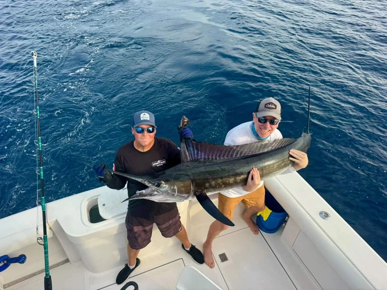 Two anglers with large yellowfin tuna